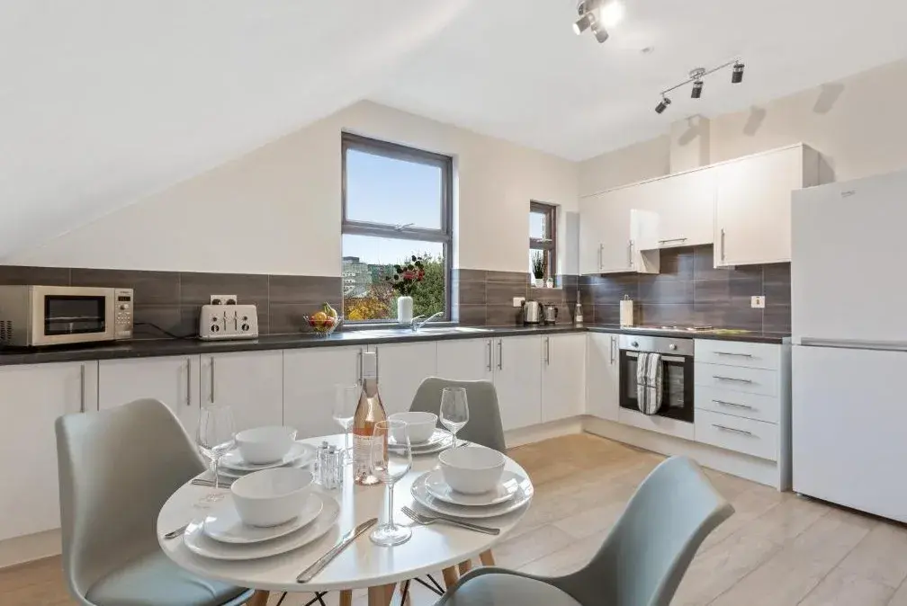 Communal kitchen and dining area at River Rooms Nottingham